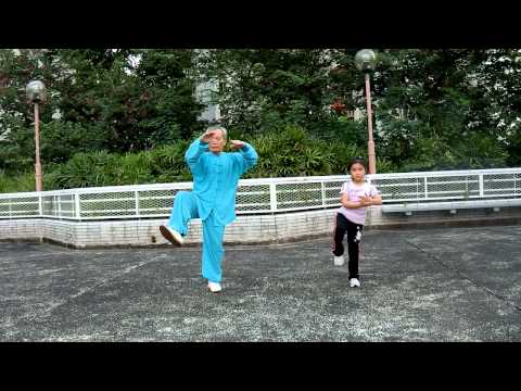 Tai Chi Master And A Little Girl